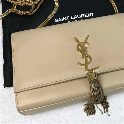 ysl gold tassel bag price|YSL kate 99 bag.